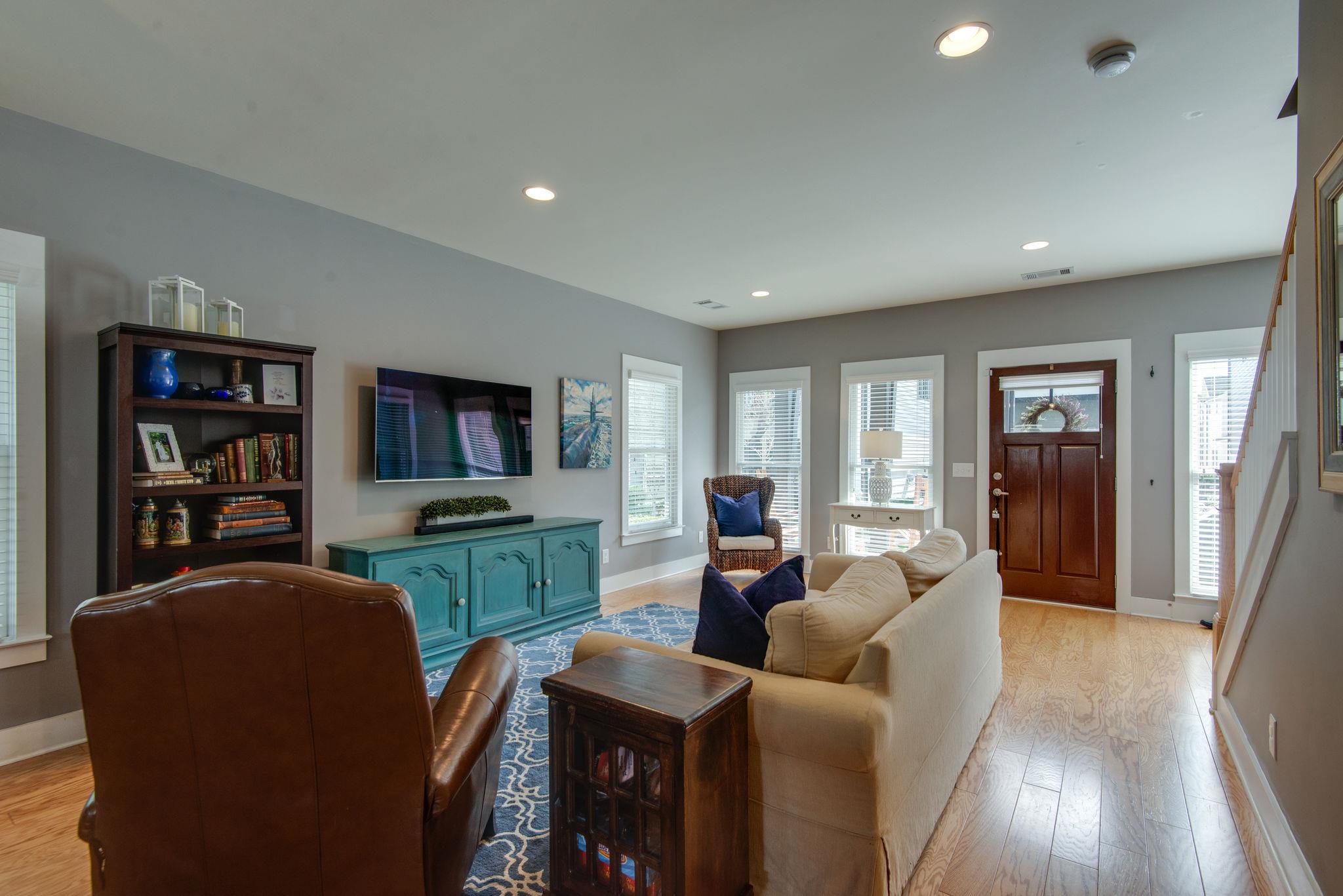 205 Copley Lane Nashville, TN 37204 - Photo 20 of 20 a living room with furniture and a flat screen tv