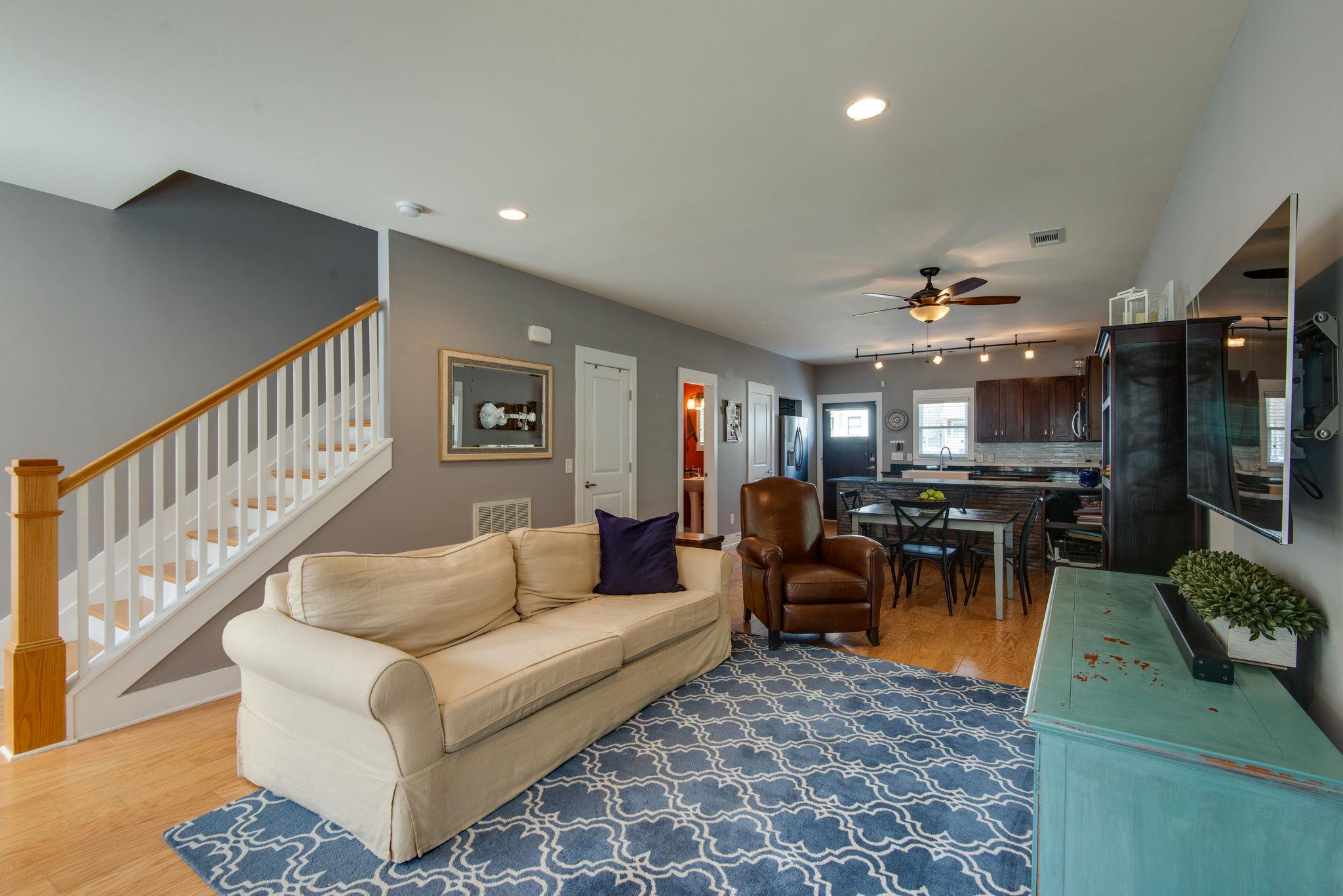 205 Copley Lane Nashville, TN 37204 - Photo 3 of 20 a living room with furniture and a flat screen tv