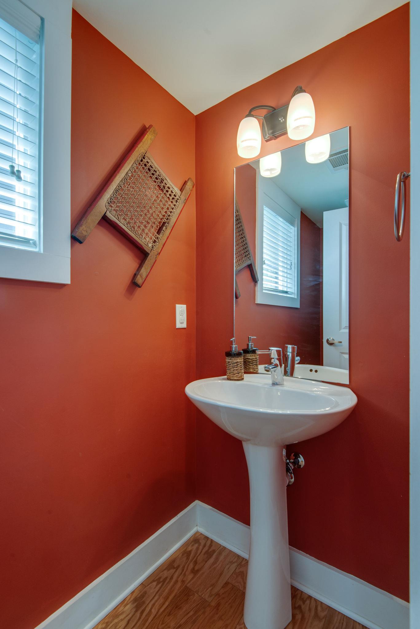 205 Copley Lane Nashville, TN 37204 - Photo 8 of 20 a bathroom with a sink and a mirror