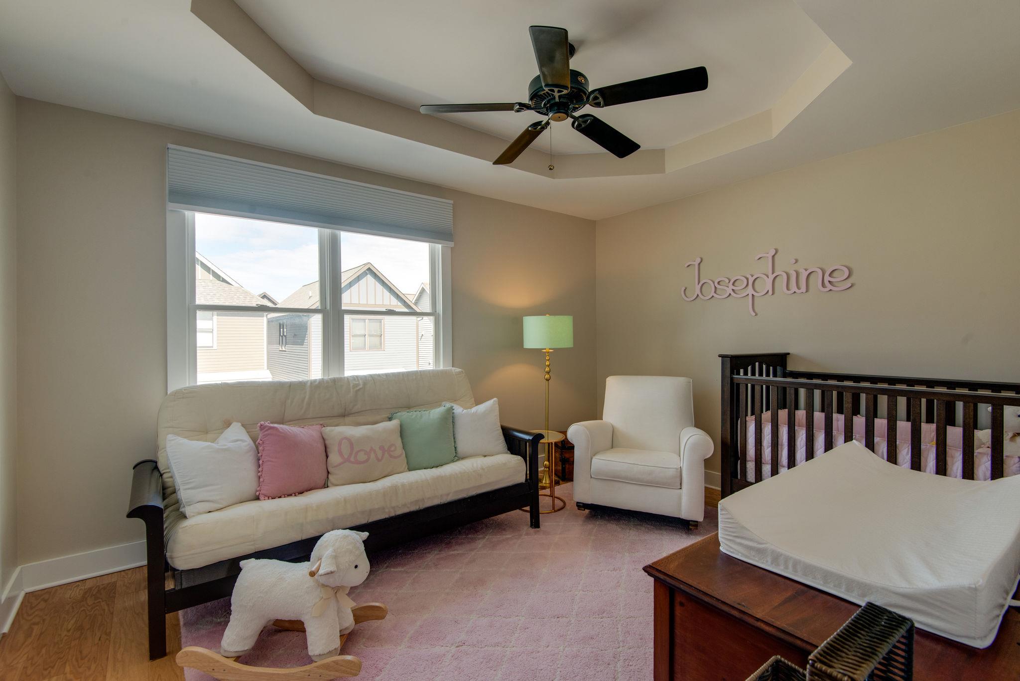 205 Copley Lane Nashville, TN 37204 - Photo 9 of 20 a living room with furniture and a window