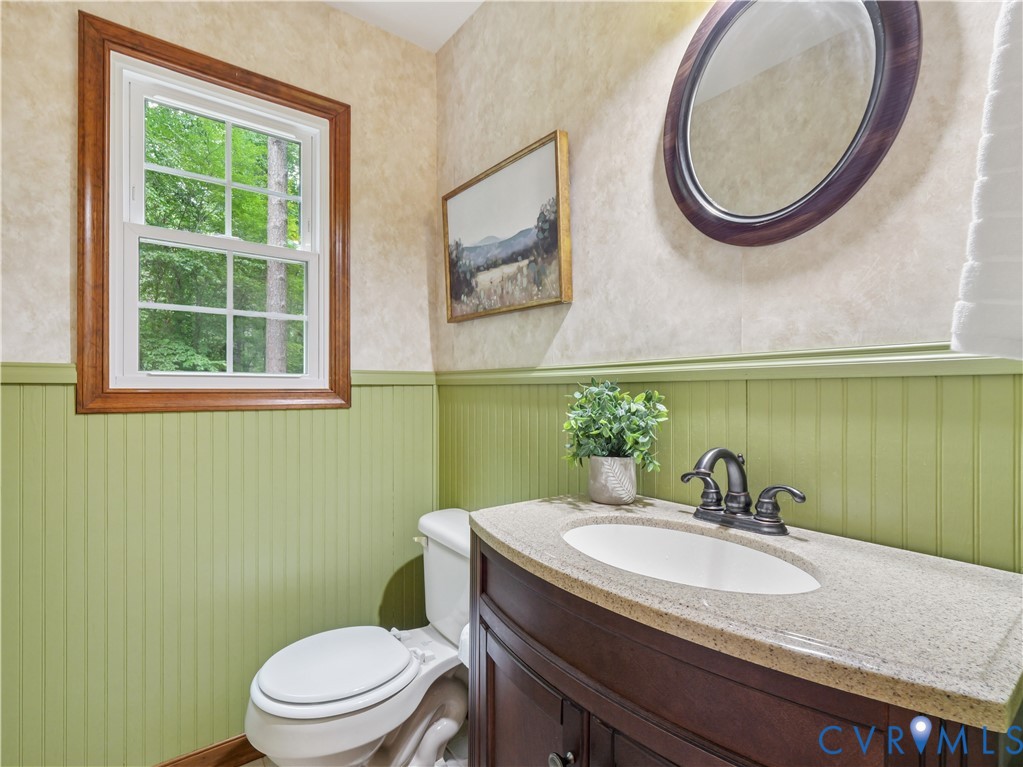 6530 Glebe Point Road Chesterfield, VA 23838 - Photo 11 of 41 a bathroom with a sink and a mirror
