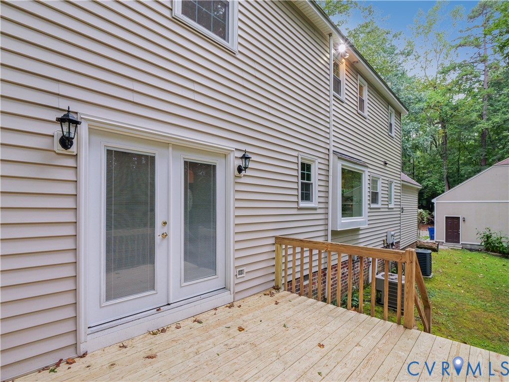 6530 Glebe Point Road Chesterfield, VA 23838 - Photo 12 of 41 a view of a wooden deck and a yard