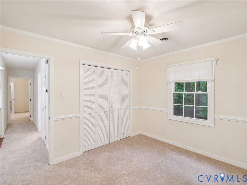 6530 Glebe Point Road Chesterfield, VA 23838 - Photo 27 of 41 an empty room with windows and fan