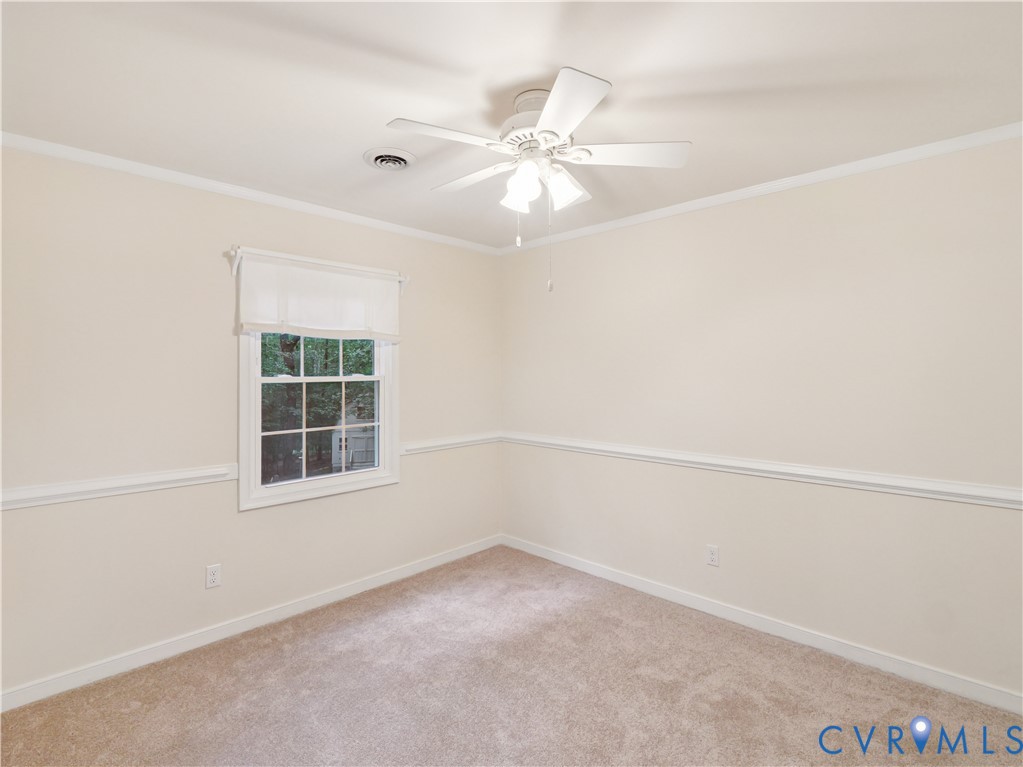 6530 Glebe Point Road Chesterfield, VA 23838 - Photo 28 of 41 an empty room with windows and fan