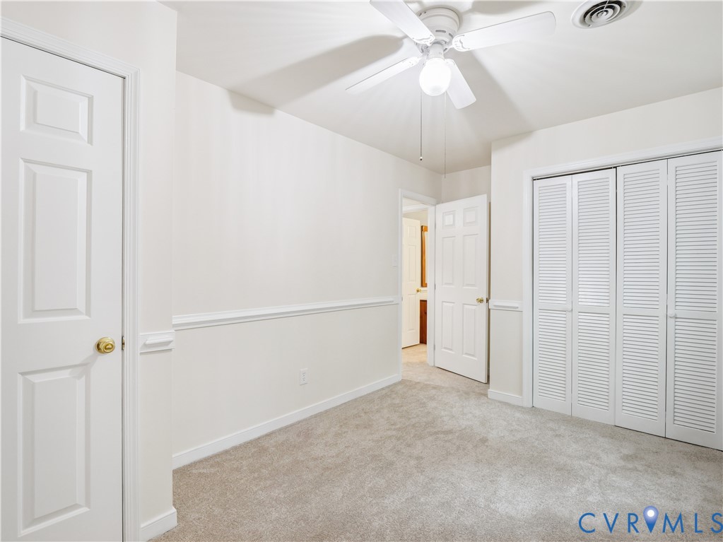 6530 Glebe Point Road Chesterfield, VA 23838 - Photo 29 of 41 an empty room with fan and entrance