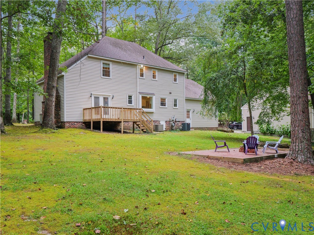 6530 Glebe Point Road Chesterfield, VA 23838 - Photo 38 of 41 a view of a house with backyard sitting area and garden