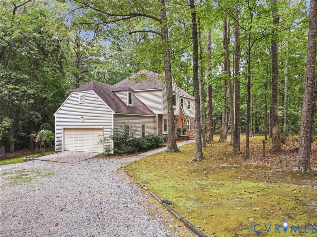 6530 Glebe Point Road Chesterfield, VA 23838 - Photo 41 of 41 a house with trees in the background