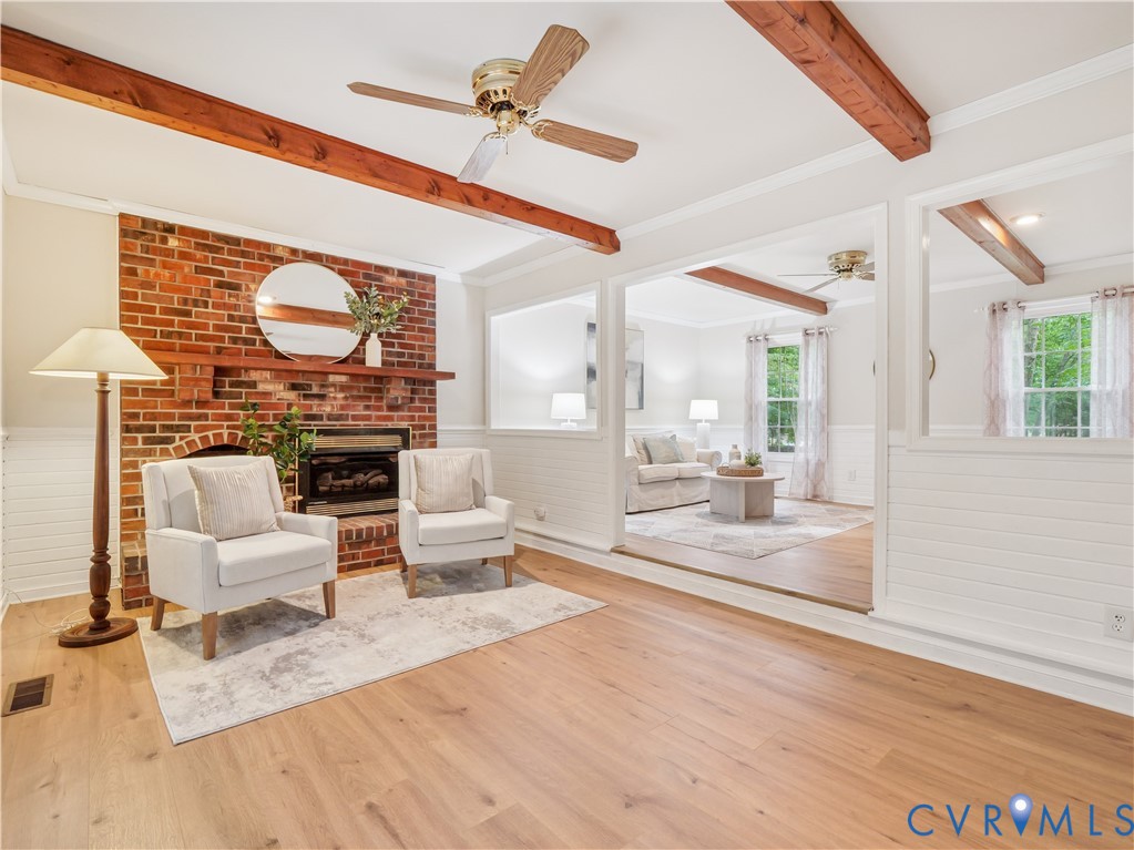 6530 Glebe Point Road Chesterfield, VA 23838 - Photo 8 of 41 a living room with furniture a fireplace and a large window