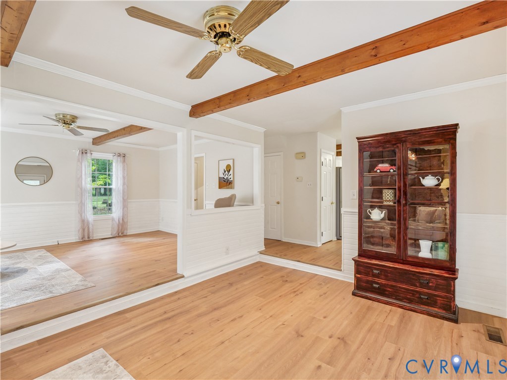 6530 Glebe Point Road Chesterfield, VA 23838 - Photo 9 of 41 a view of an empty room with cabinet and a ceiling fan
