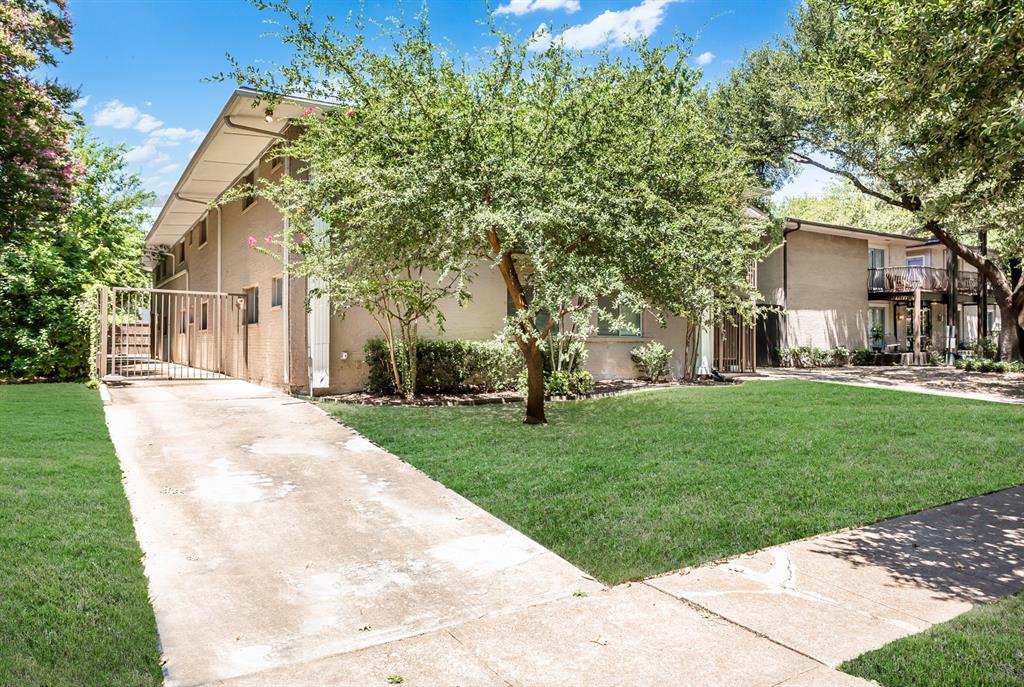 4931 Junius Street, Unit 4 Dallas, TX 75214 - Photo 2 of 31 front view of a house with a yard