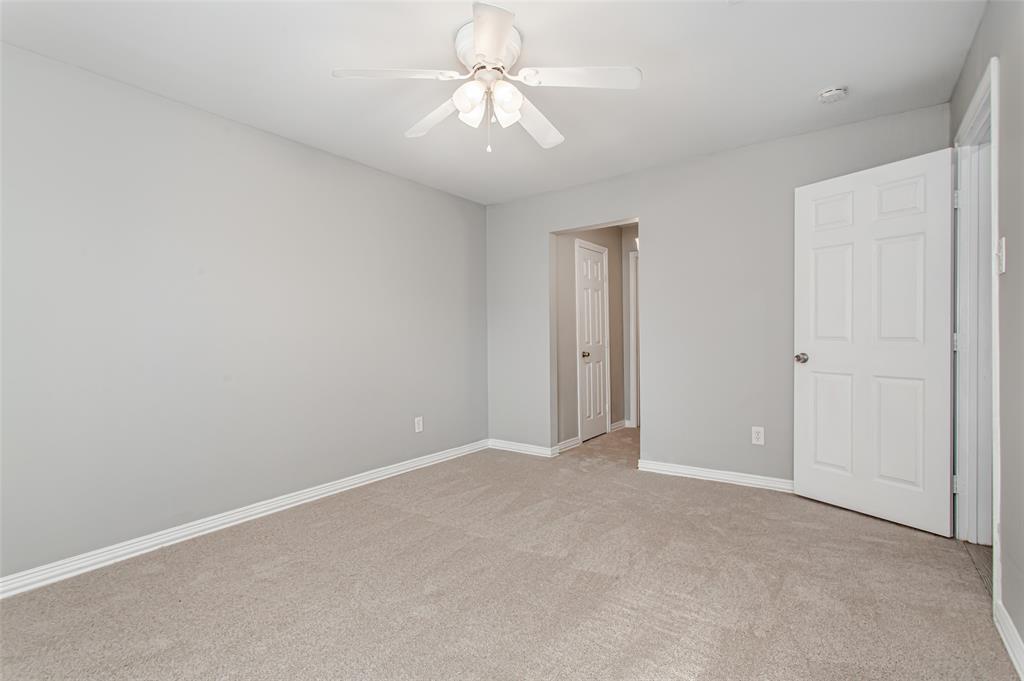 4931 Junius Street, Unit 4 Dallas, TX 75214 - Photo 26 of 31 wooden floor in an empty room