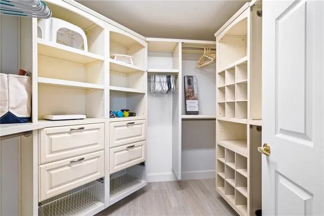 a view of an empty walk in closet