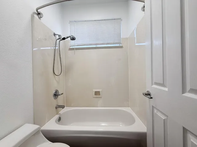a bathroom with a tub