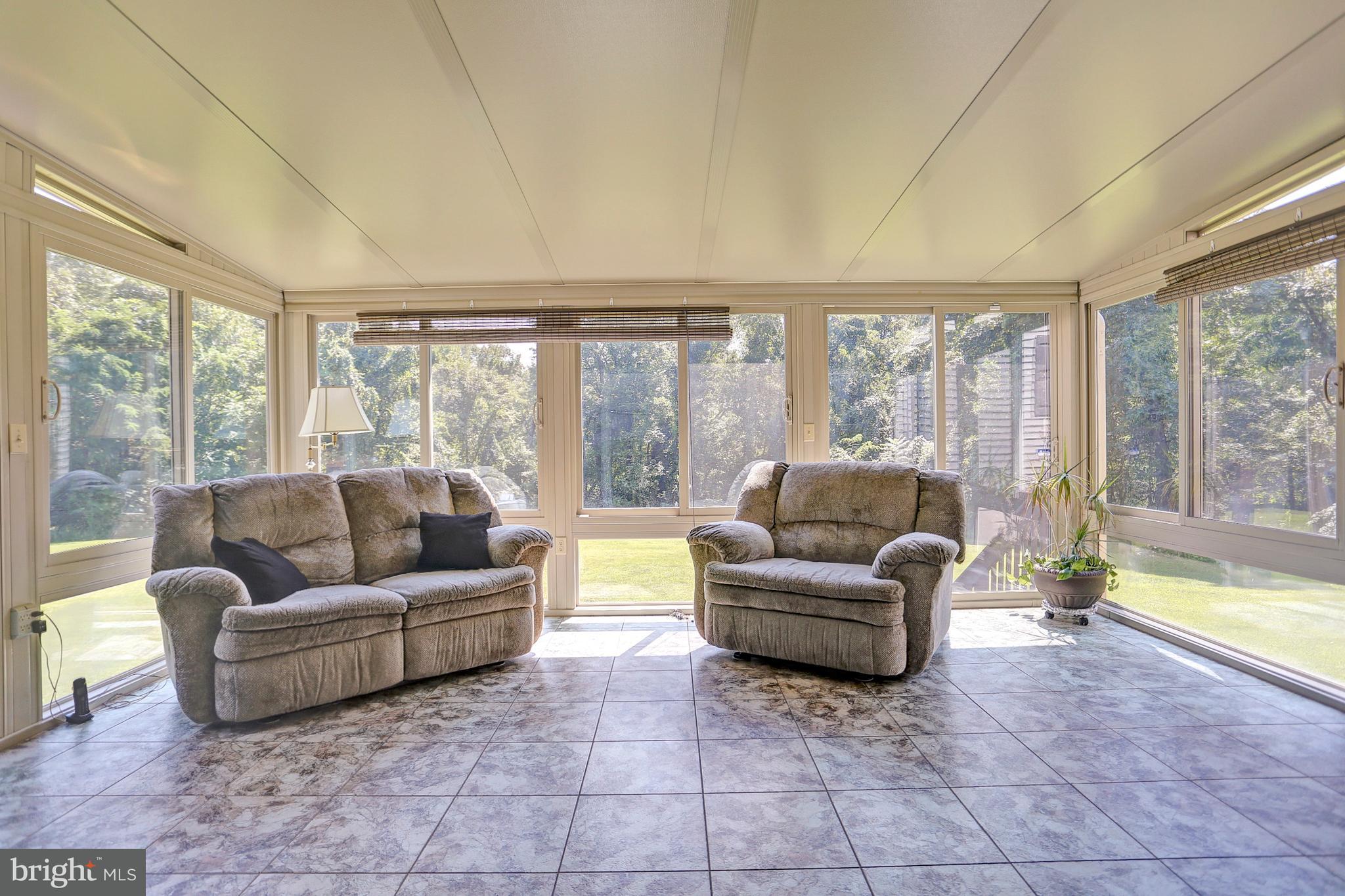2154 Valley Road Enola, PA 17025 - Photo 15 of 33 Sunroom with view of rear yard & woods.