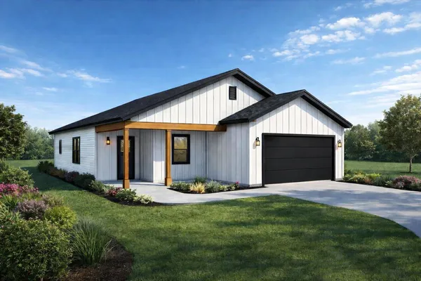a front view of house with yard and green space