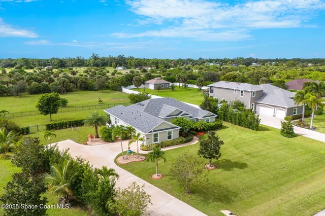 a view of a golf course with a lake