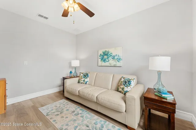 a kitchen with stainless steel appliances a refrigerator and a stove top oven