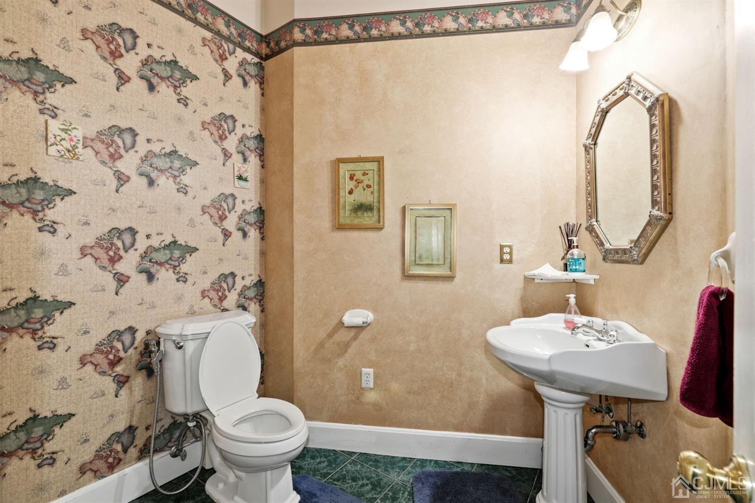 89 Elm Street Colonia, NJ 07067 - Photo 14 of 29 a bathroom with a sink toilet and shower