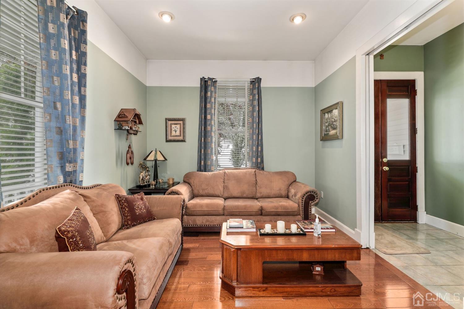 89 Elm Street Colonia, NJ 07067 - Photo 5 of 29 a living room with furniture and a couch