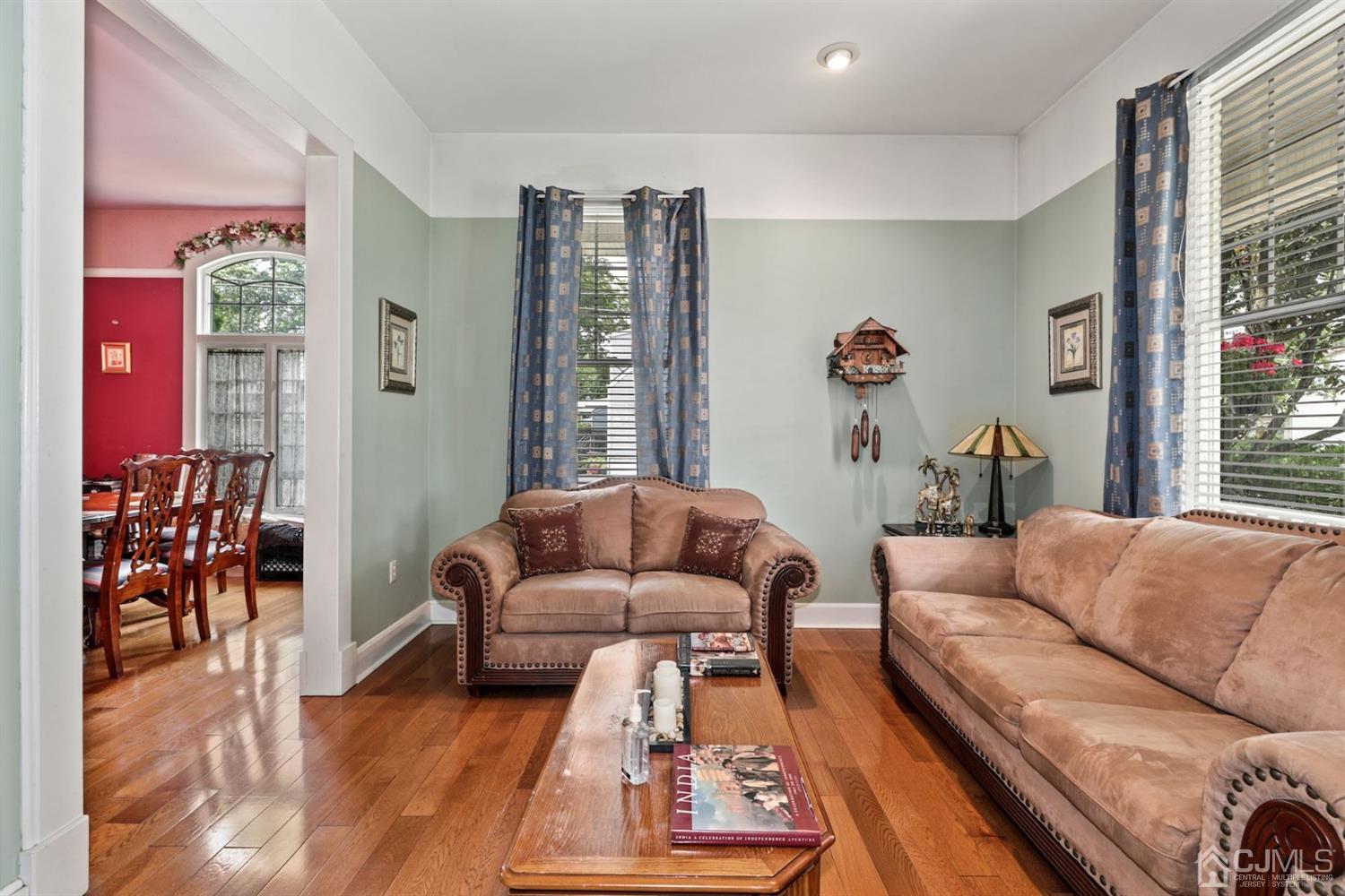 89 Elm Street Colonia, NJ 07067 - Photo 6 of 29 a living room with furniture and a couch