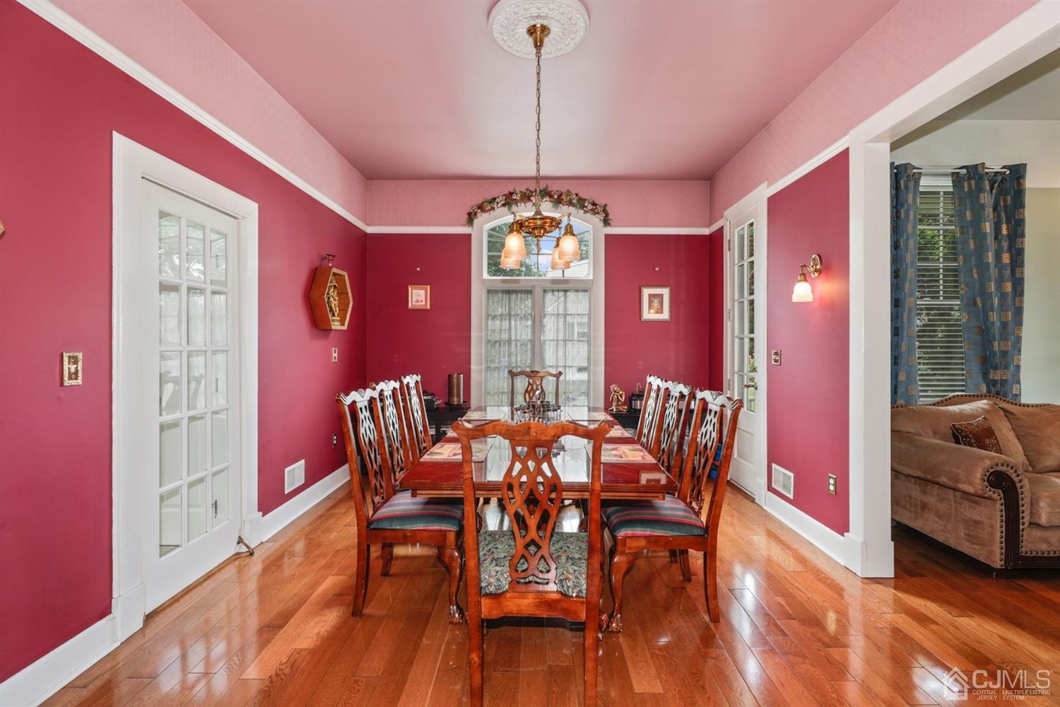 89 Elm Street Colonia, NJ 07067 - Photo 7 of 29 a dining room with furniture window and wooden floor