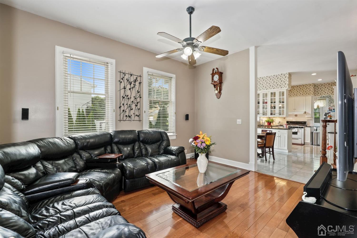 89 Elm Street Colonia, NJ 07067 - Photo 9 of 29 a living room with furniture and a large window