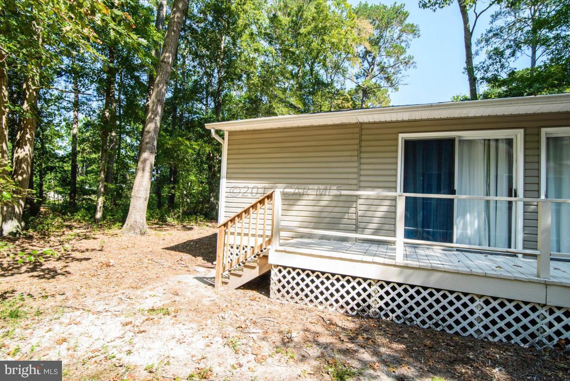 125 Pinehurst Road Ocean Pines, MD 21811 - Photo 26 of 49 a view of a house with a large window