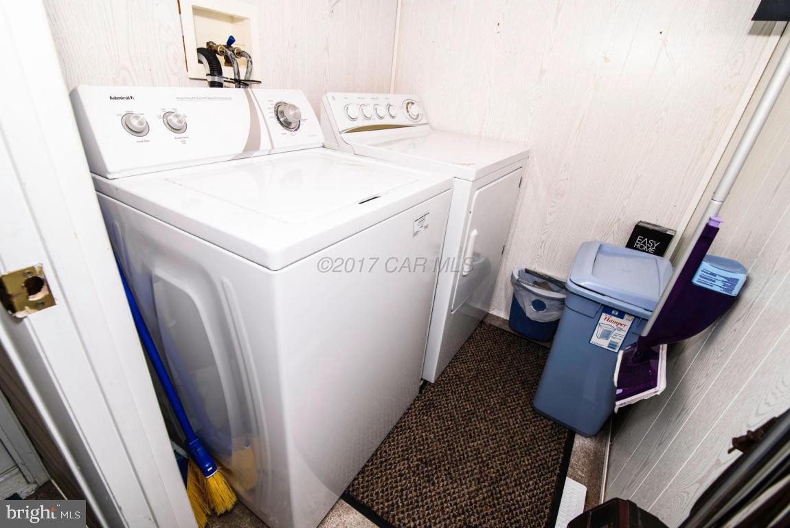 125 Pinehurst Road Ocean Pines, MD 21811 - Photo 42 of 49 a utility room with dryer and washer