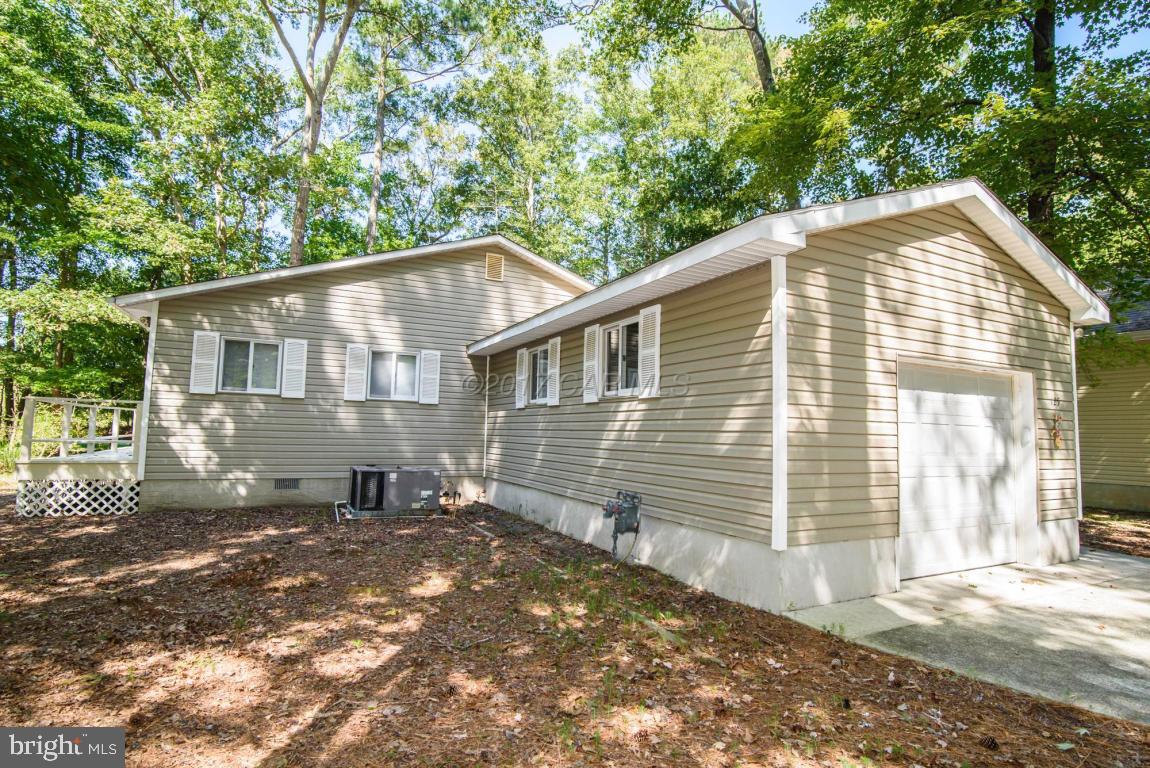 125 Pinehurst Road Ocean Pines, MD 21811 - Photo 45 of 49 a view of a house with a yard