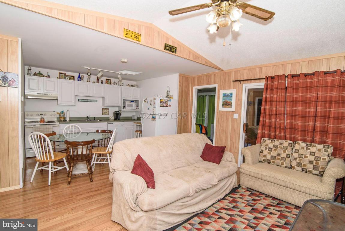 125 Pinehurst Road Ocean Pines, MD 21811 - Photo 7 of 49 a living room with furniture and a large window
