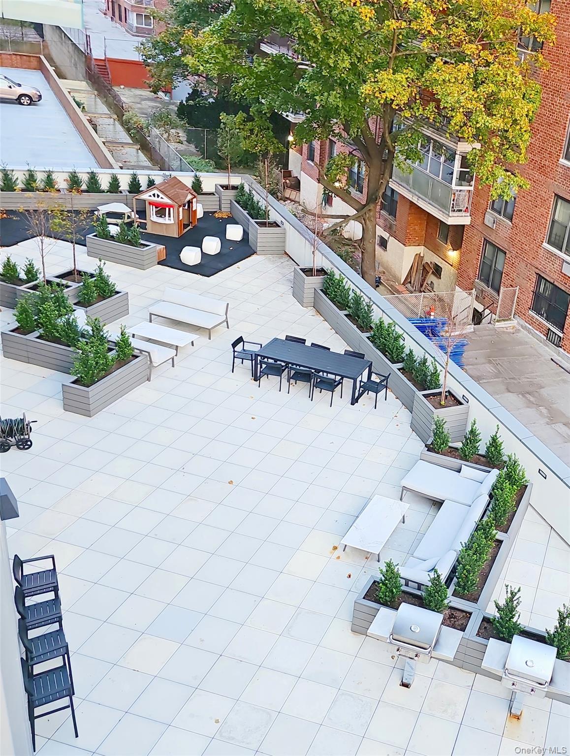 136-18 Maple Avenue, Unit 5B Queens, NY 11355 - Photo 22 of 31 an outdoor space with patio