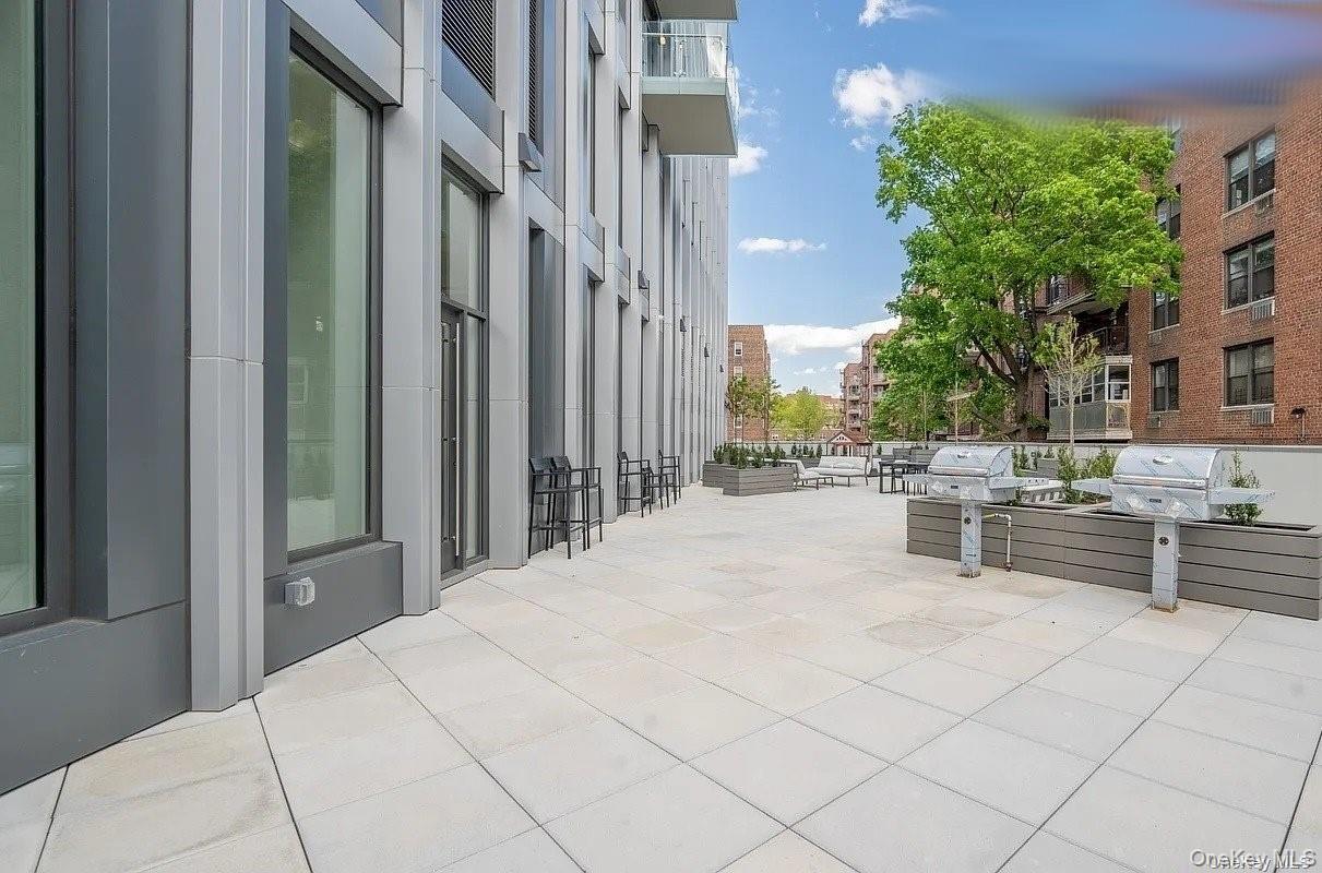 136-18 Maple Avenue, Unit 5B Queens, NY 11355 - Photo 8 of 31 a view of balcony and patio