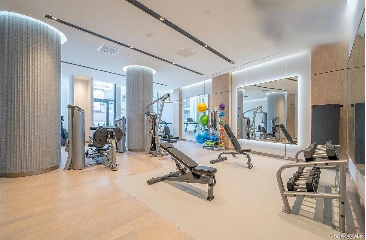 136-18 Maple Avenue, Unit 5B Queens, NY 11355 - Photo 10 of 31 a view of a room with gym equipment