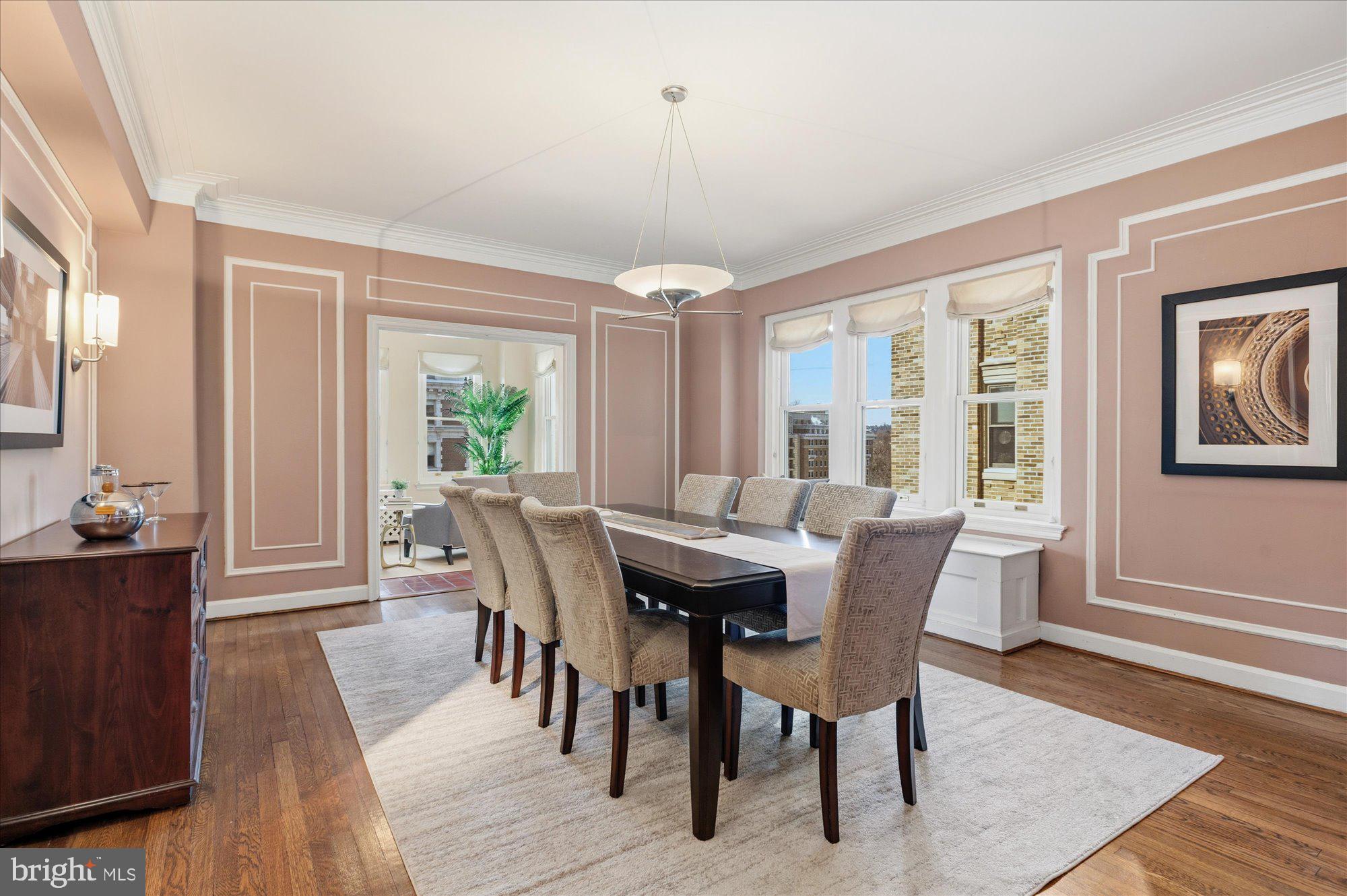2101 Connecticut Avenue Northwest, Unit 53 Washington, DC 20009 - Photo 13 of 45 a view of a a dining room with furniture window and wooden floor