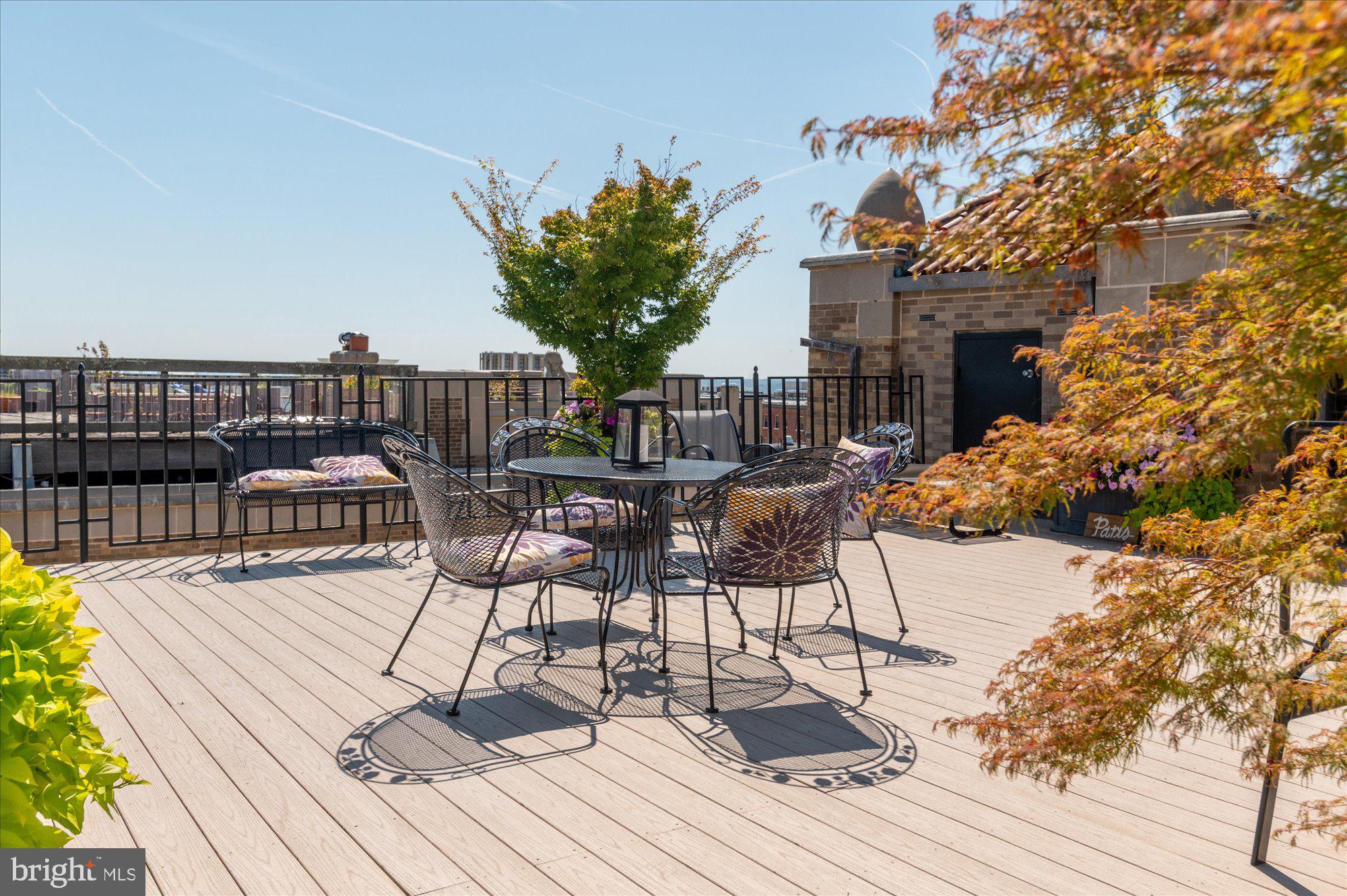 2101 Connecticut Avenue Northwest, Unit 53 Washington, DC 20009 - Photo 34 of 45 a view of a chairs and table on the wooden floor