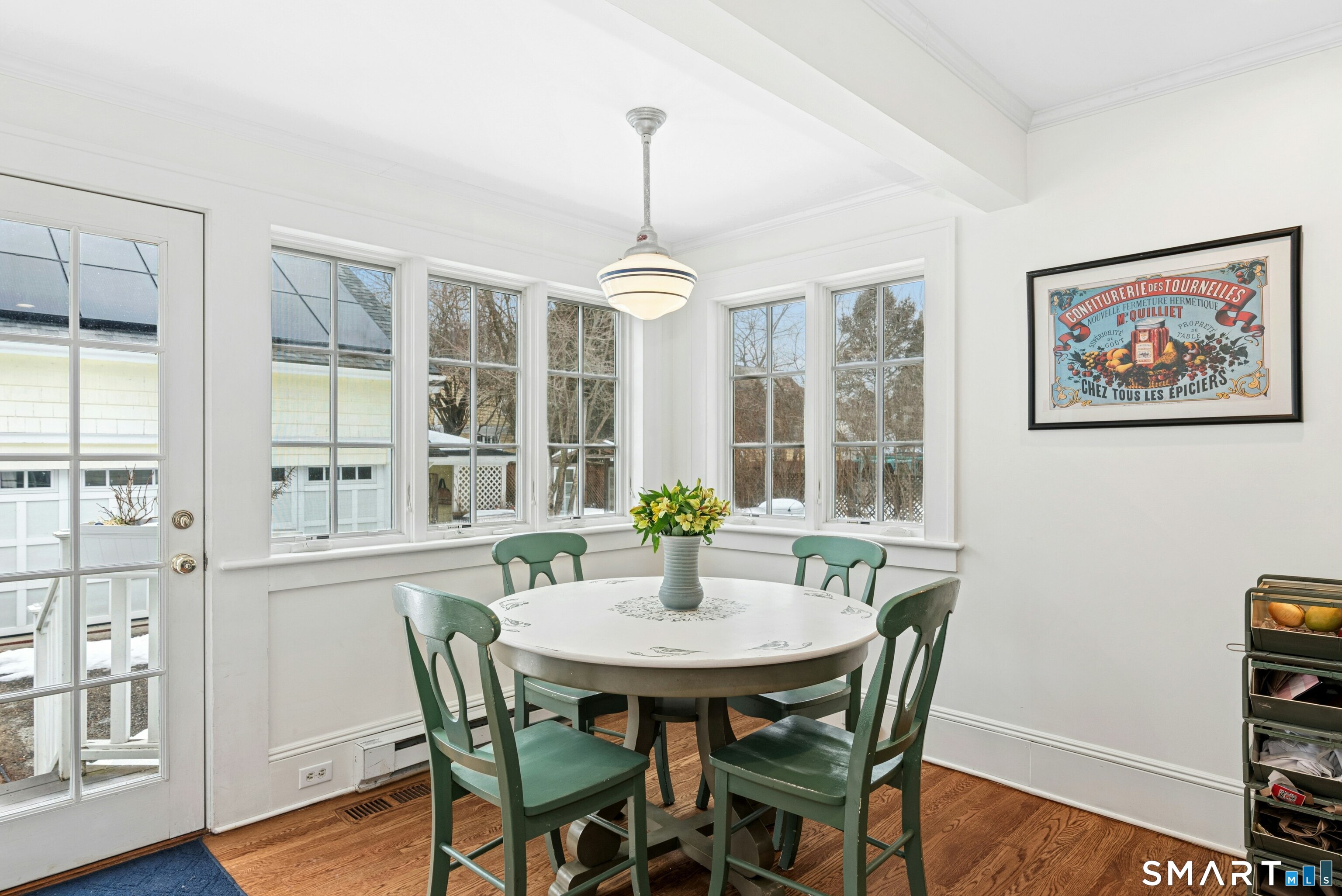 84 Algonquin Road Fairfield, CT 06825 - Photo 12 of 28 a view of a dining room with furniture window and wooden floor