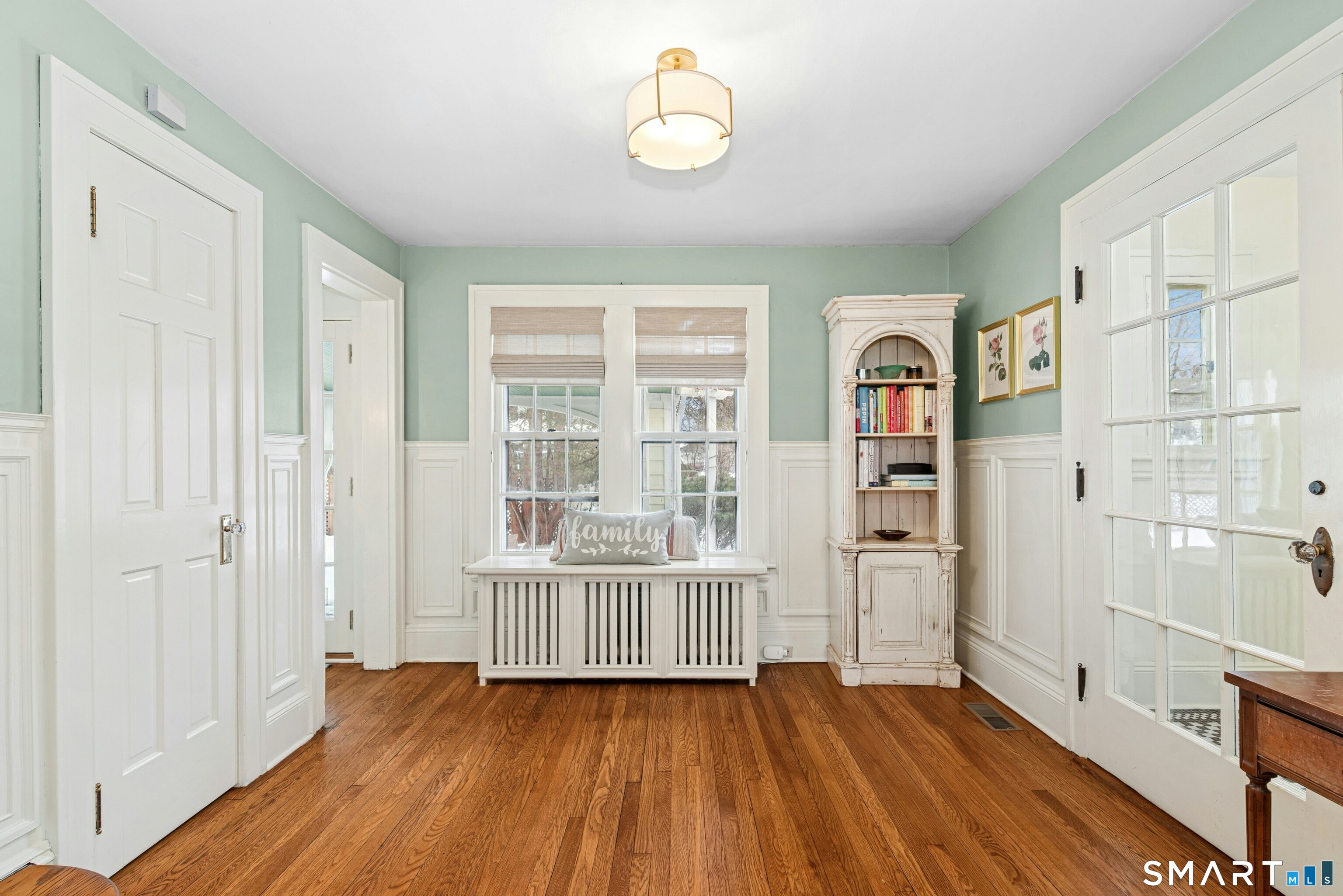 84 Algonquin Road Fairfield, CT 06825 - Photo 15 of 28 wooden floor in an empty room with a window