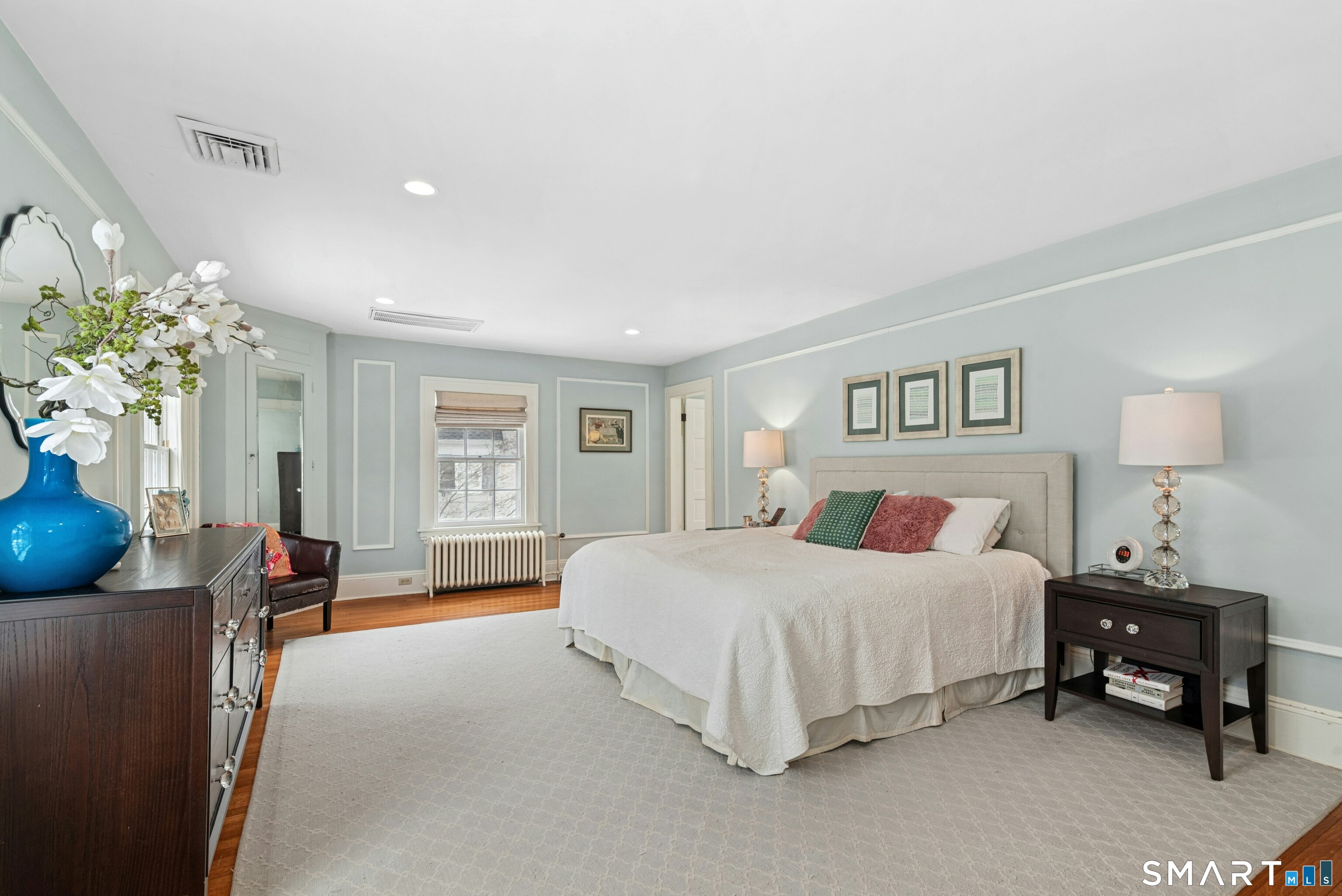 84 Algonquin Road Fairfield, CT 06825 - Photo 16 of 28 a bedroom with a bed and a couch