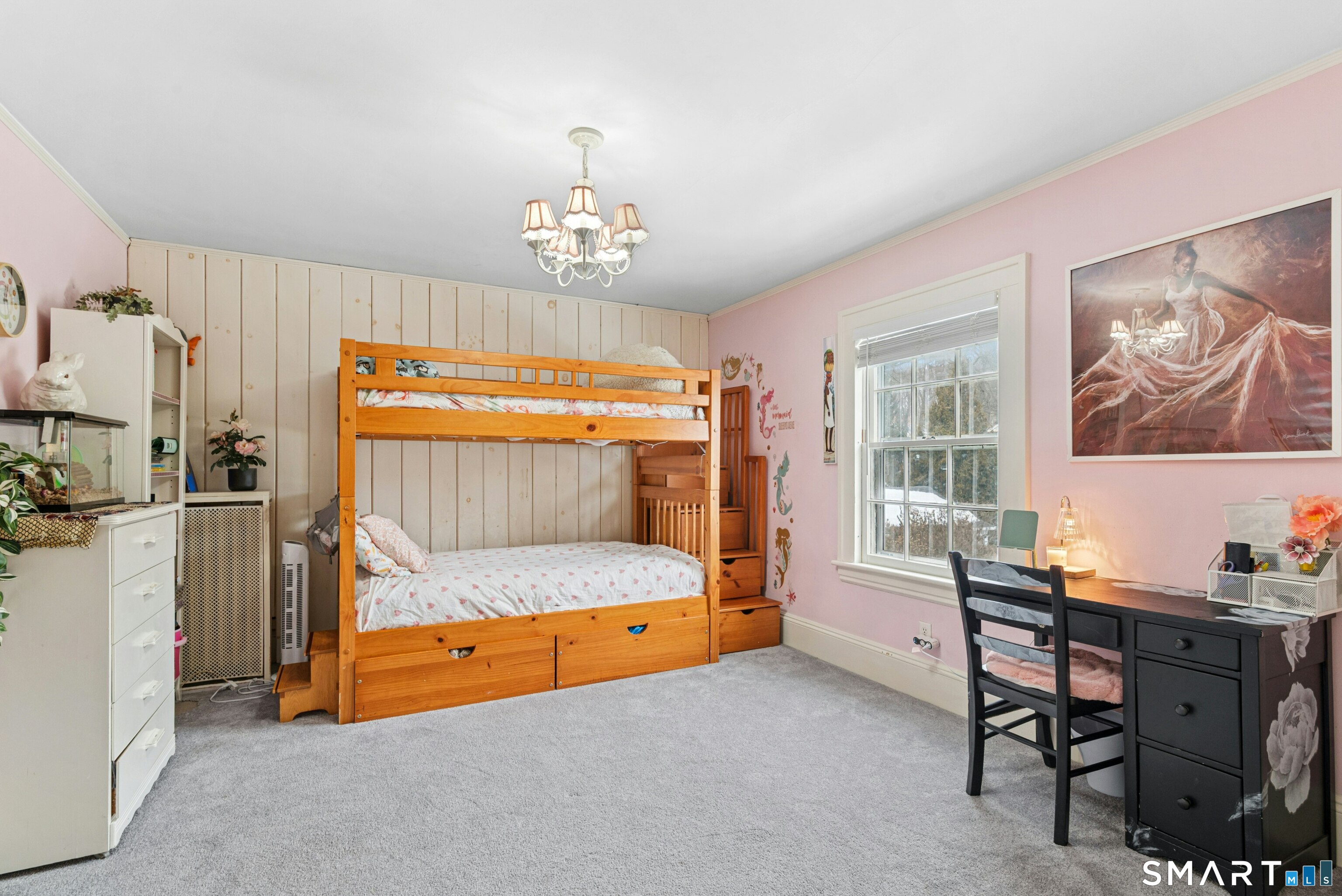 84 Algonquin Road Fairfield, CT 06825 - Photo 22 of 28 a bedroom with a bed and a table in it