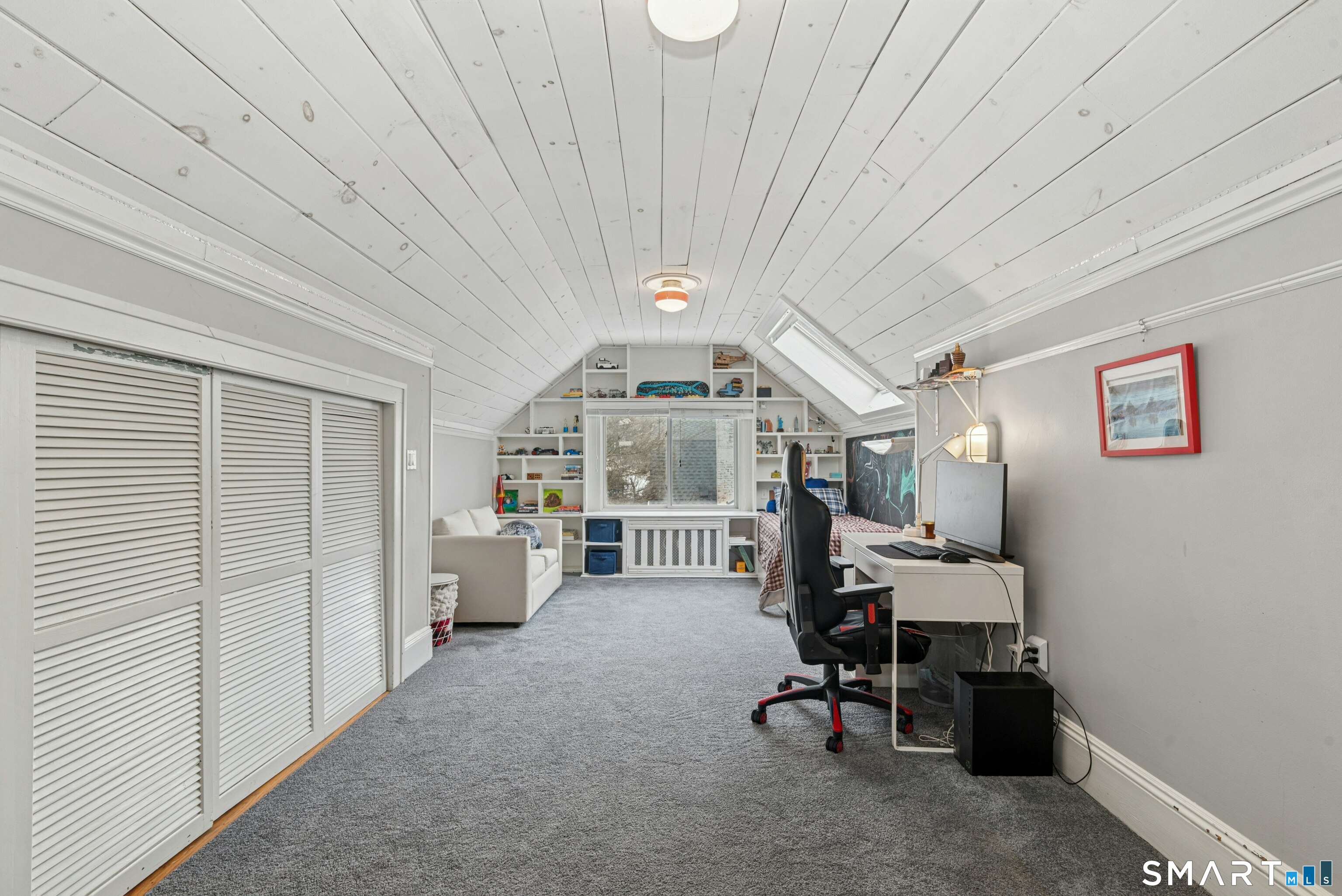 84 Algonquin Road Fairfield, CT 06825 - Photo 24 of 28 a room with furniture and white walls
