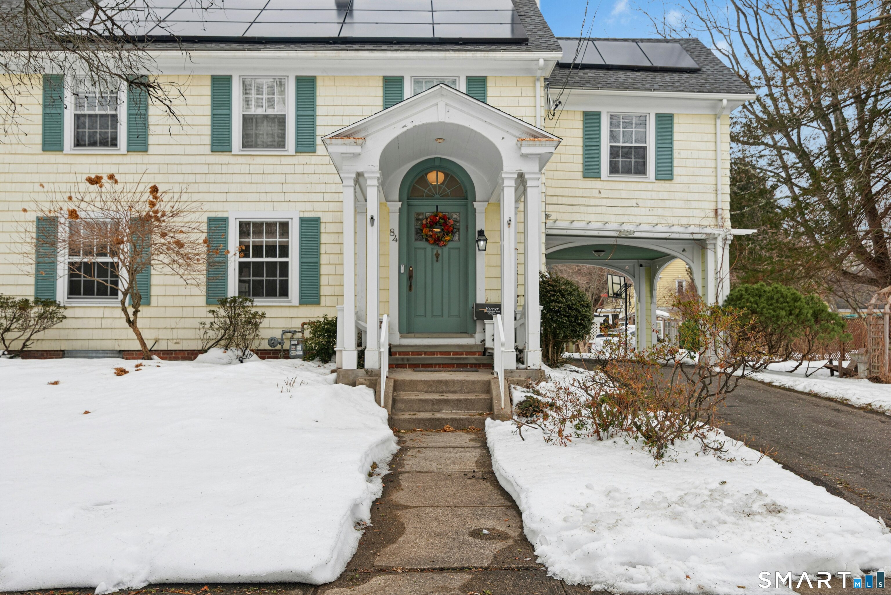 84 Algonquin Road Fairfield, CT 06825 - Photo 3 of 28 a view of a house with more windows