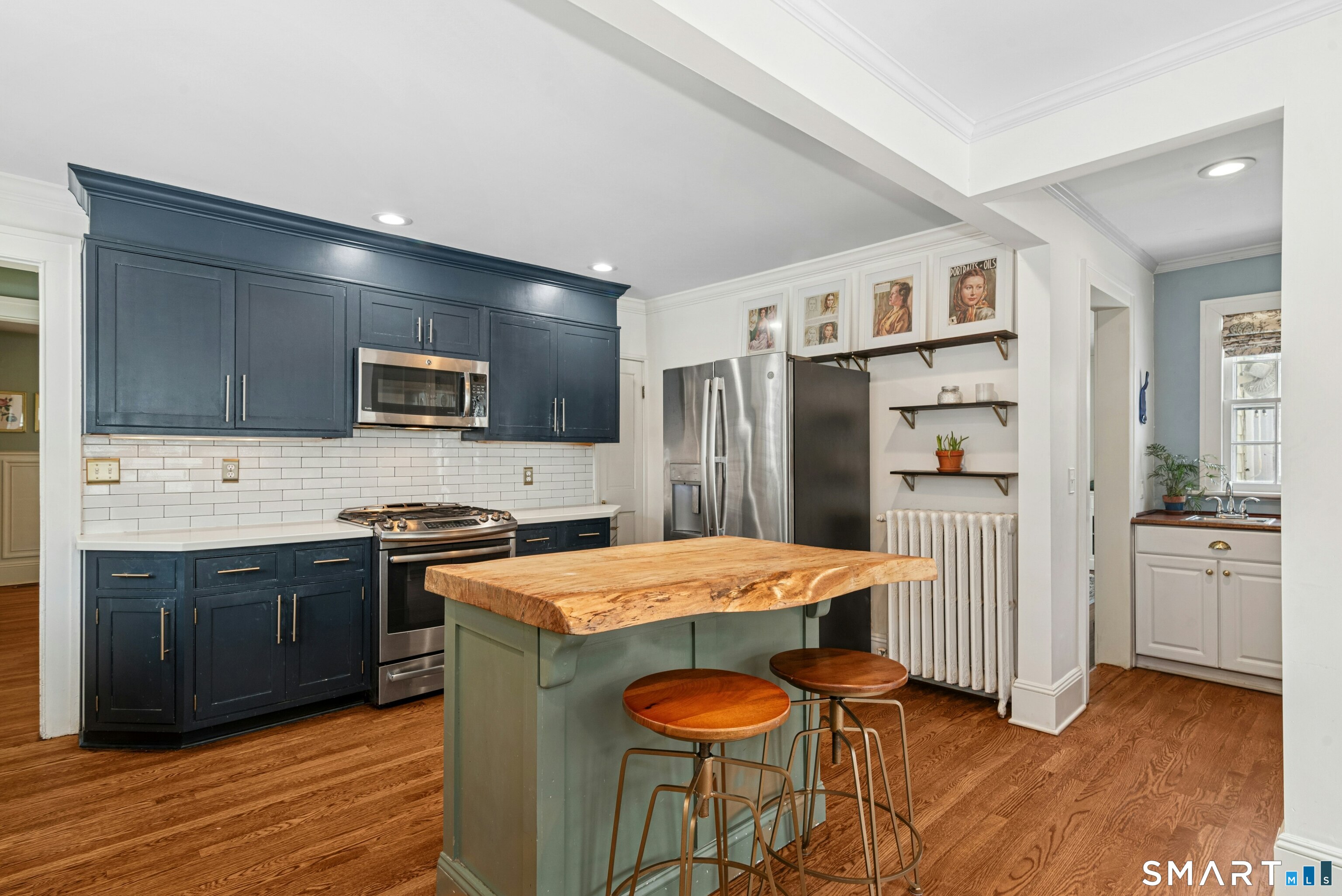 84 Algonquin Road Fairfield, CT 06825 - Photo 10 of 28 a kitchen with stainless steel appliances granite countertop a refrigerator stove microwave and sink