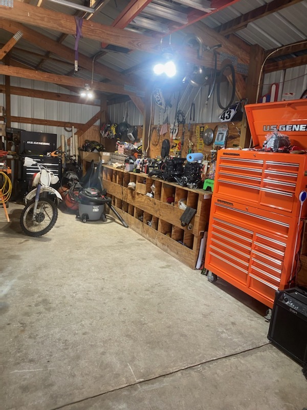 1765 West Mine Road Mazon, IL 60444 - Photo 7 of 21 a view of a garage with parked cars