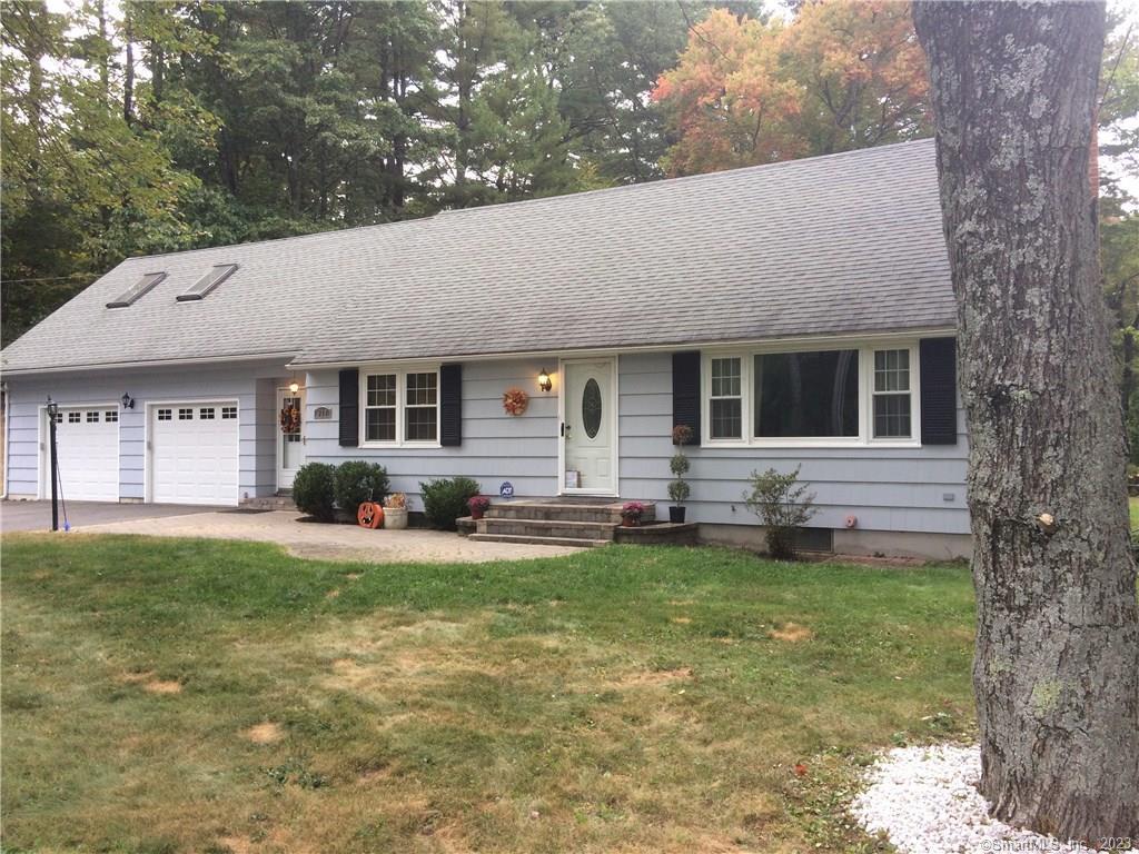 638 Country Club Road Avon, CT 06001 - Photo 1 of 1 a view of a house with a patio and a yard