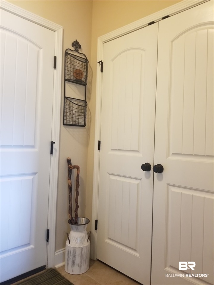 1145 Crown Walk Drive Foley, AL 36535 - Photo 25 of 32 Double pantry doors leading to large pantry.