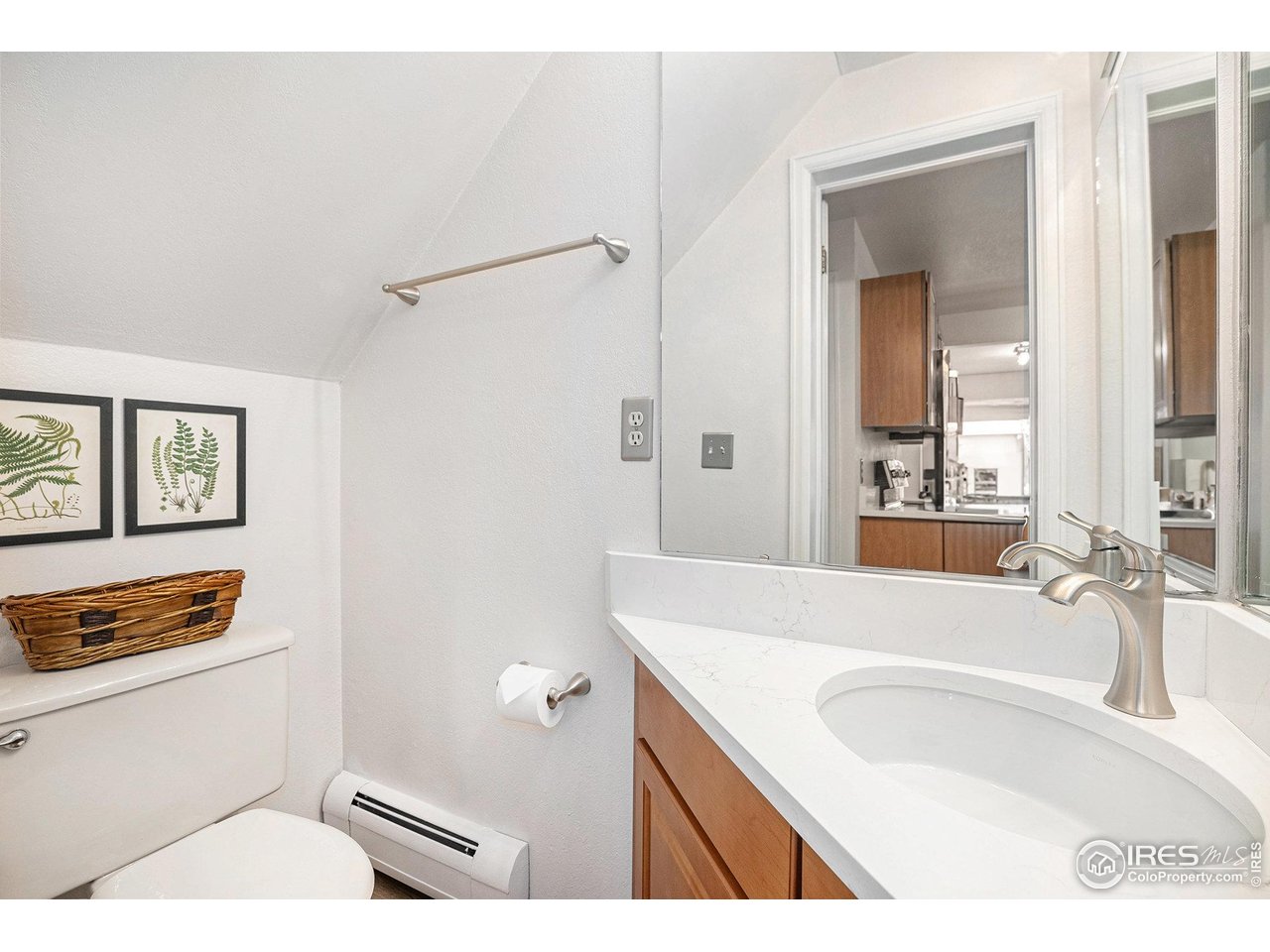2254 Spruce Street, Unit A Boulder, CO 80302 - Photo 14 of 15 a bathroom with a granite countertop sink a mirror and a bathtub