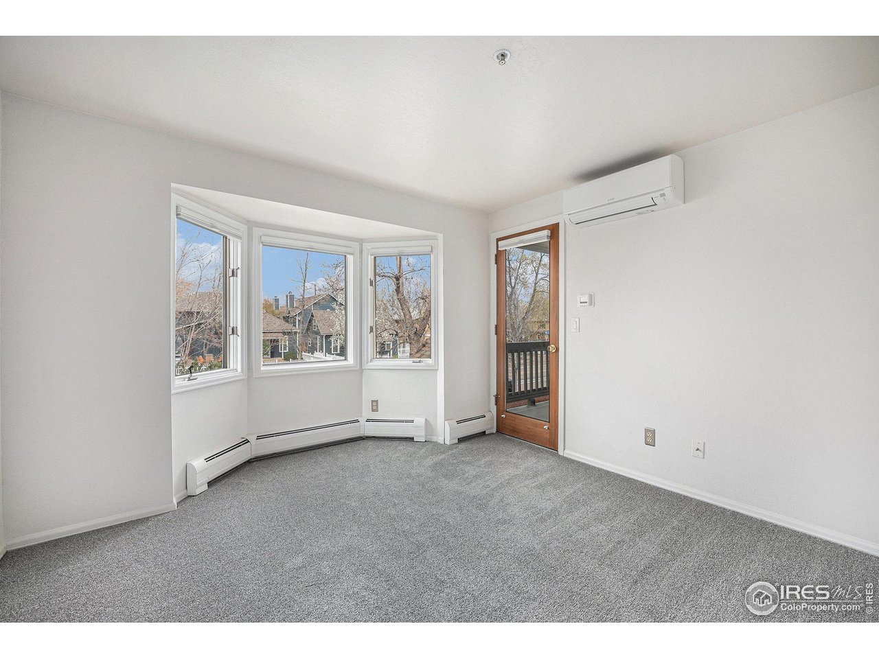 2254 Spruce Street, Unit A Boulder, CO 80302 - Photo 7 of 15 a view of an empty room with a window
