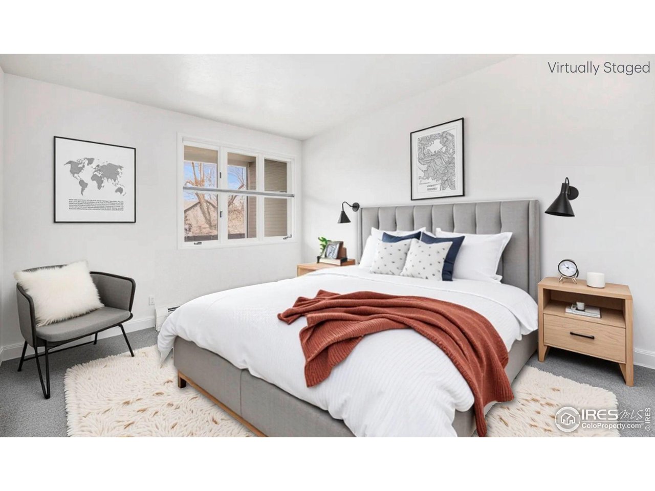 2254 Spruce Street, Unit A Boulder, CO 80302 - Photo 10 of 15 a bedroom with a bed and a chair