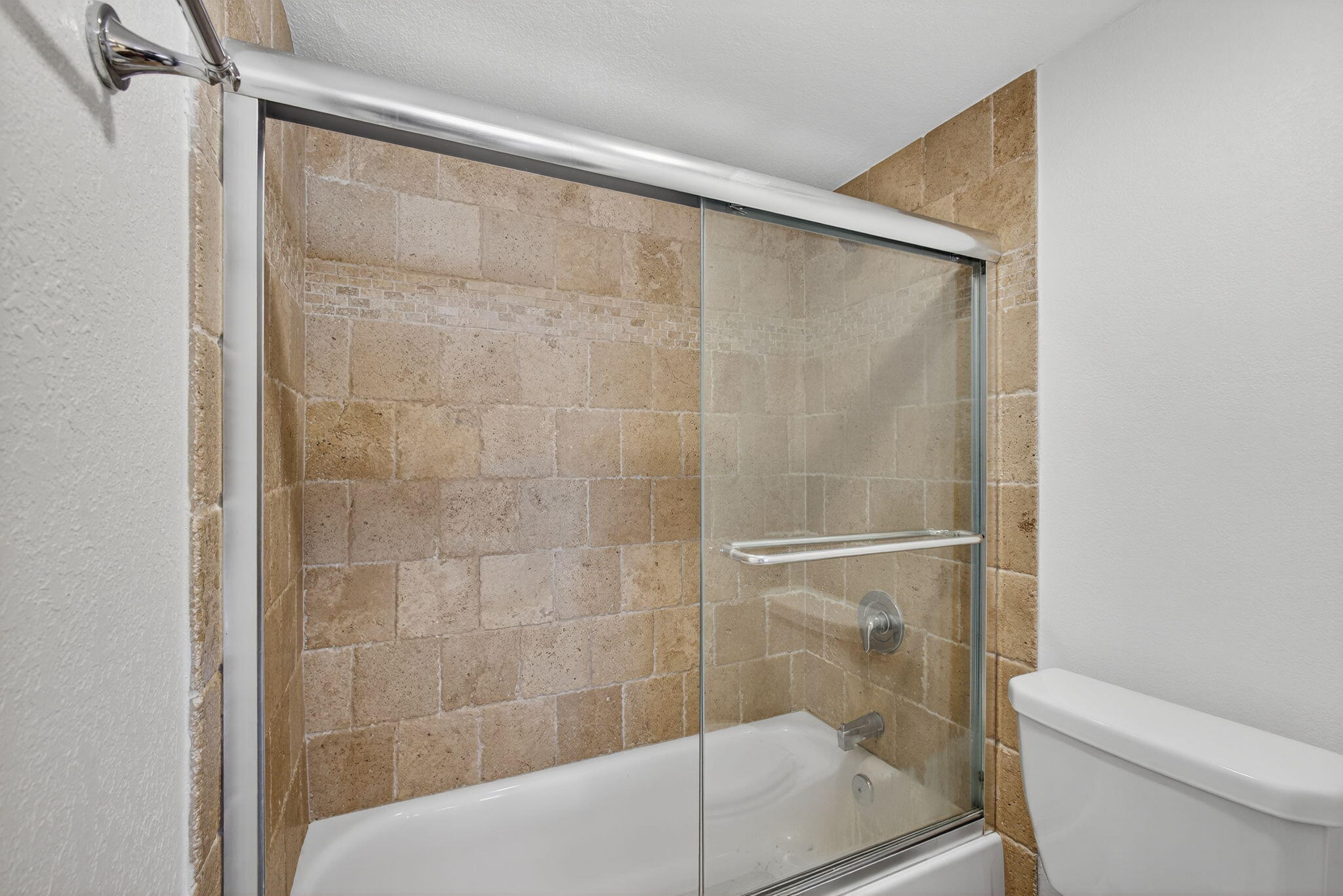 5600 North Flagler Drive, Unit 2703 West Palm Beach, FL 33407 - Photo 19 of 60 a bathroom with a shower and a toilet