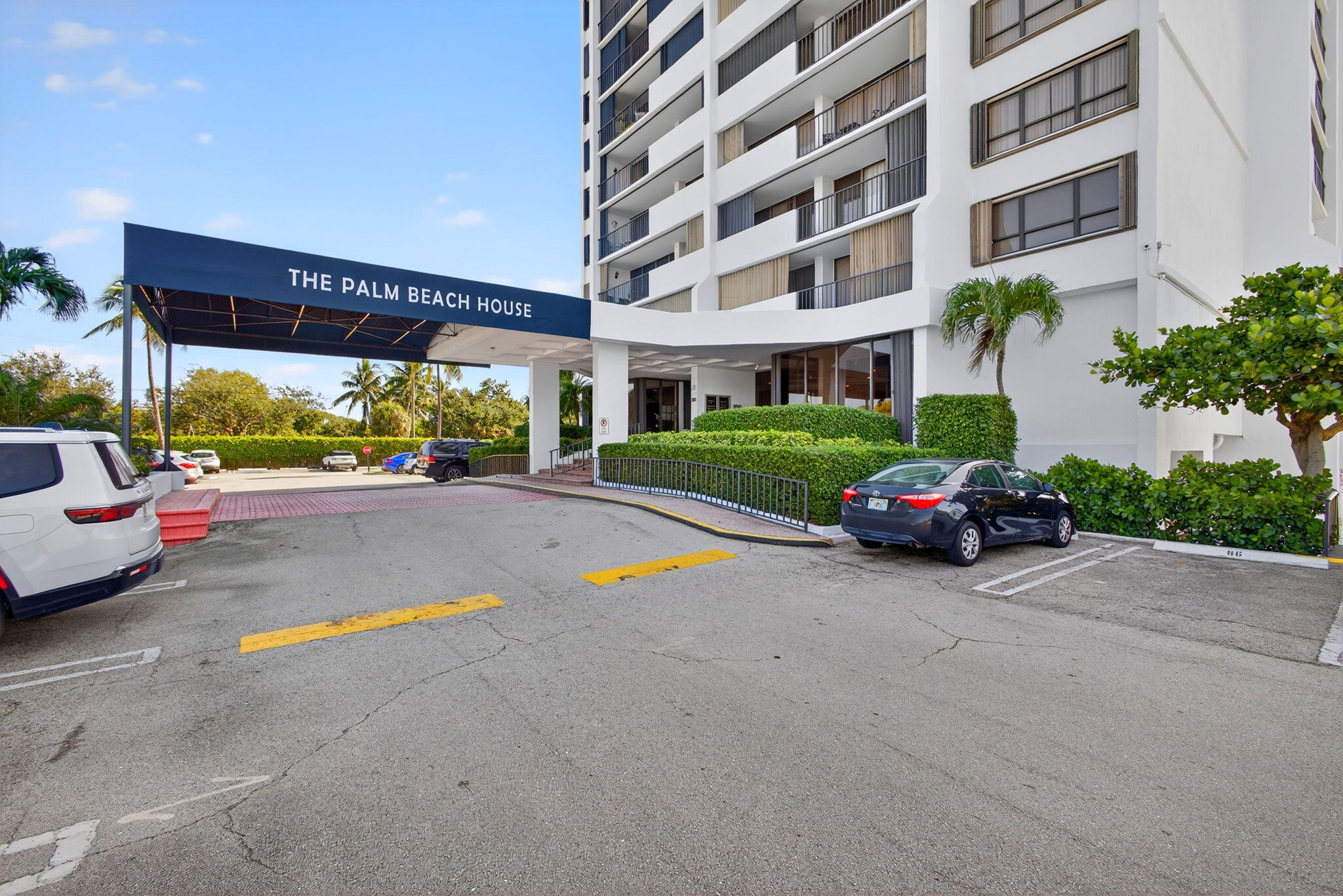 5600 North Flagler Drive, Unit 2703 West Palm Beach, FL 33407 - Photo 25 of 60 a view of building with outdoor space and parking